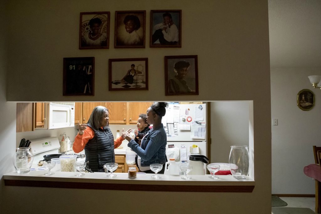 Third Place, Sports Picture Story - Jessica Phelps / Newark Advocate, “Coaching Creates Deep Roots For Croom Family”Tashia Croom holds her young son, Kendrix while she visits with her grandmother, Ruby Stinson before her daughter, Taliyah's first basketball of the year, November 21, 2020.